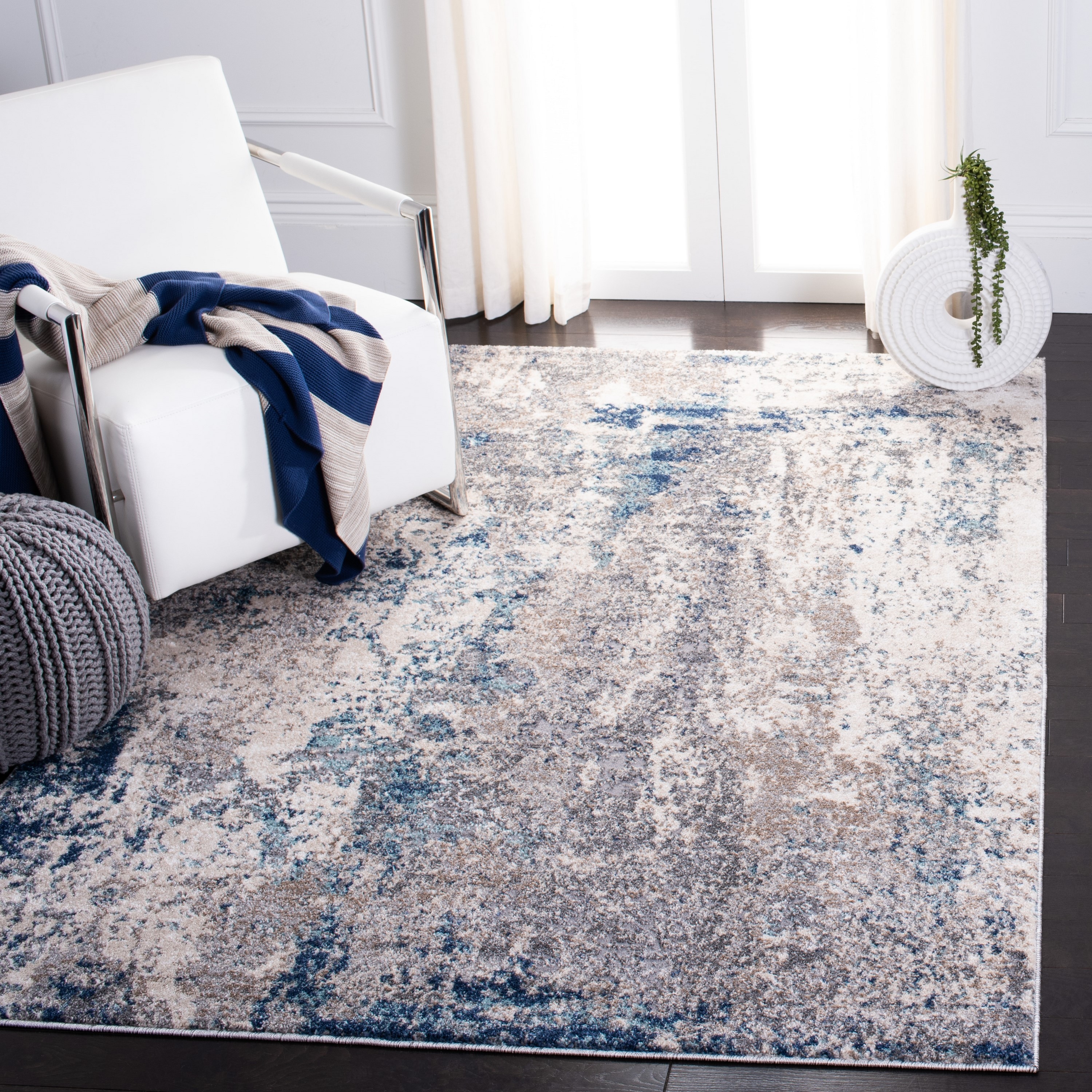 4' x 6' Gray and Navy Abstract Synthetic Area Rug