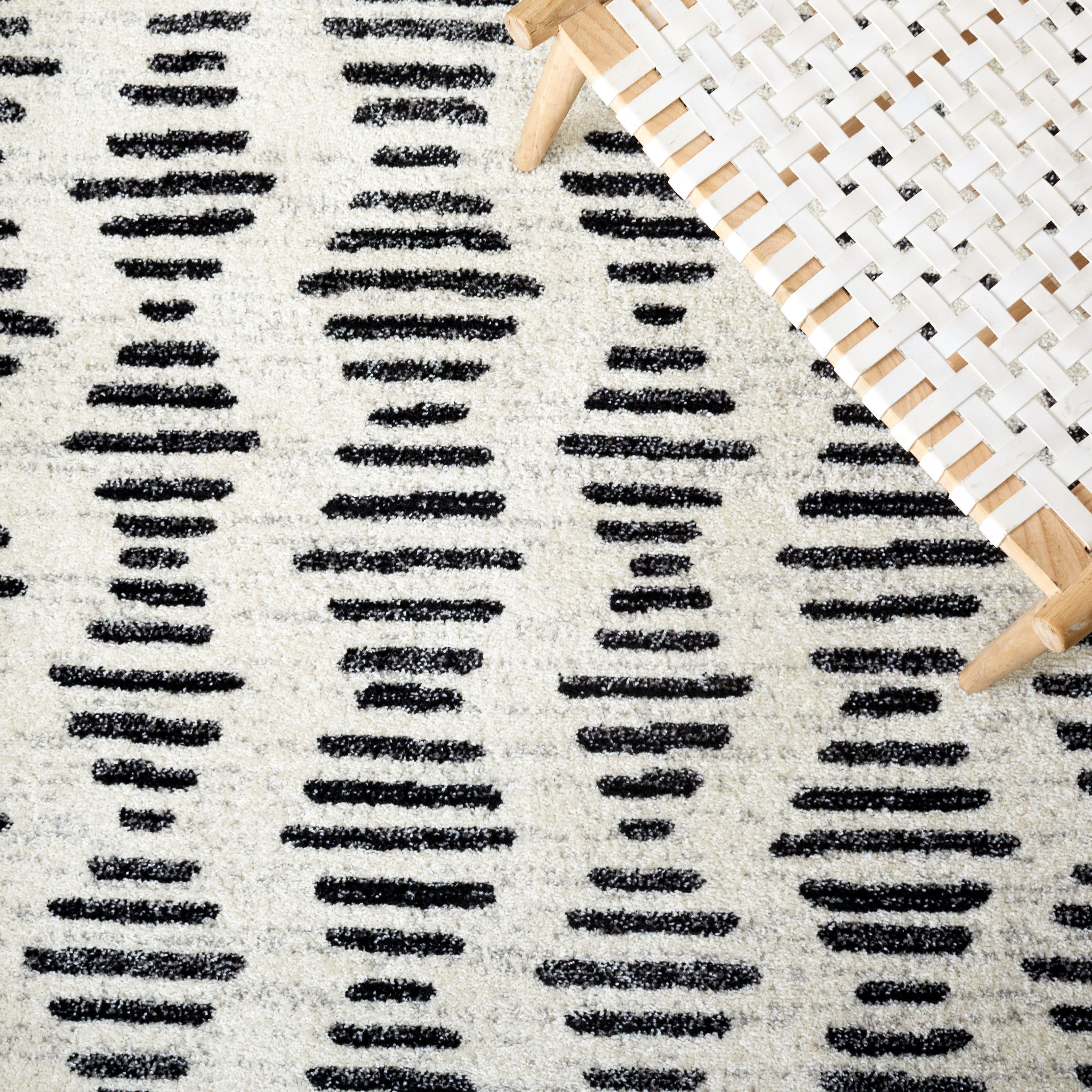 Reversible Black Synthetic 8' x 10' Easy-Care Area Rug