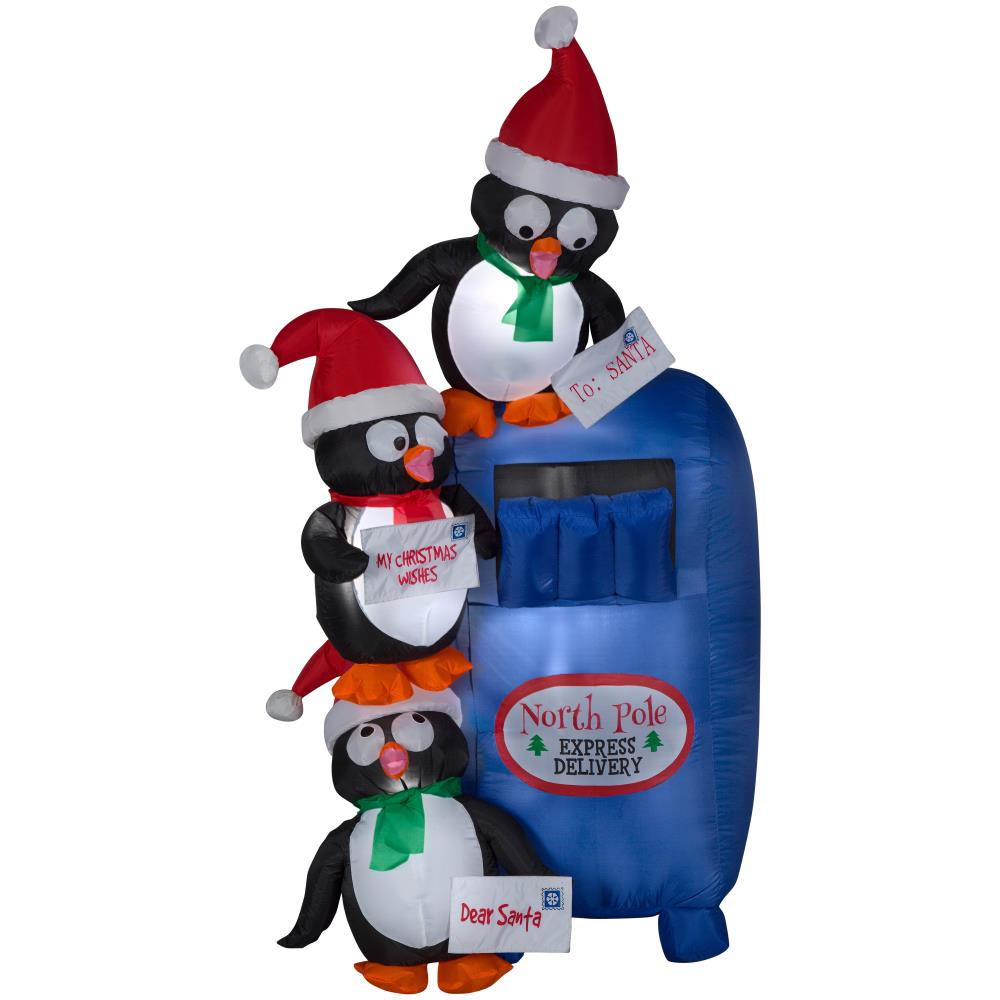 Santa Getting A Wedgie From Penguin Christmas Inflatable 4 ft 