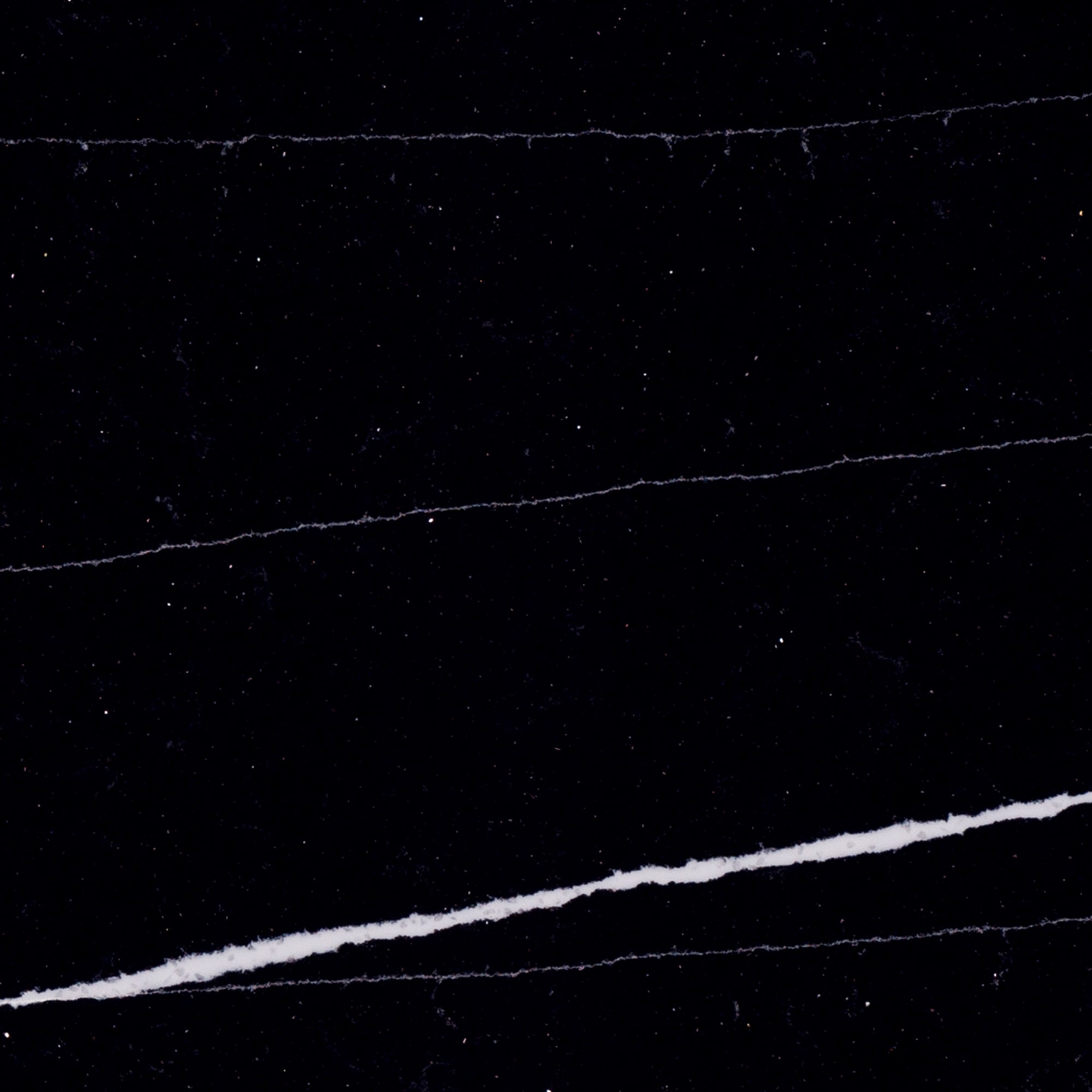 ONE Quartz OQ76SLBM11/4X1L Black Canyon Black Canyon Quartz Black Kitchen Countertop SAMPLE ( 4-in x 6-in )
