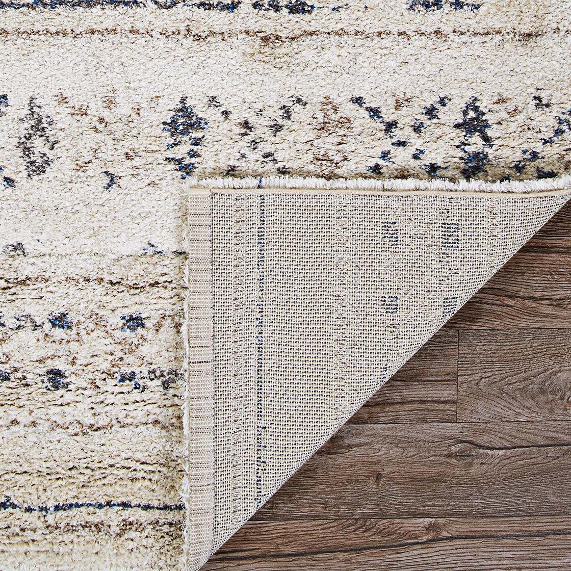 Ivory and Caramel Wool Synthetic Shag Area Rug