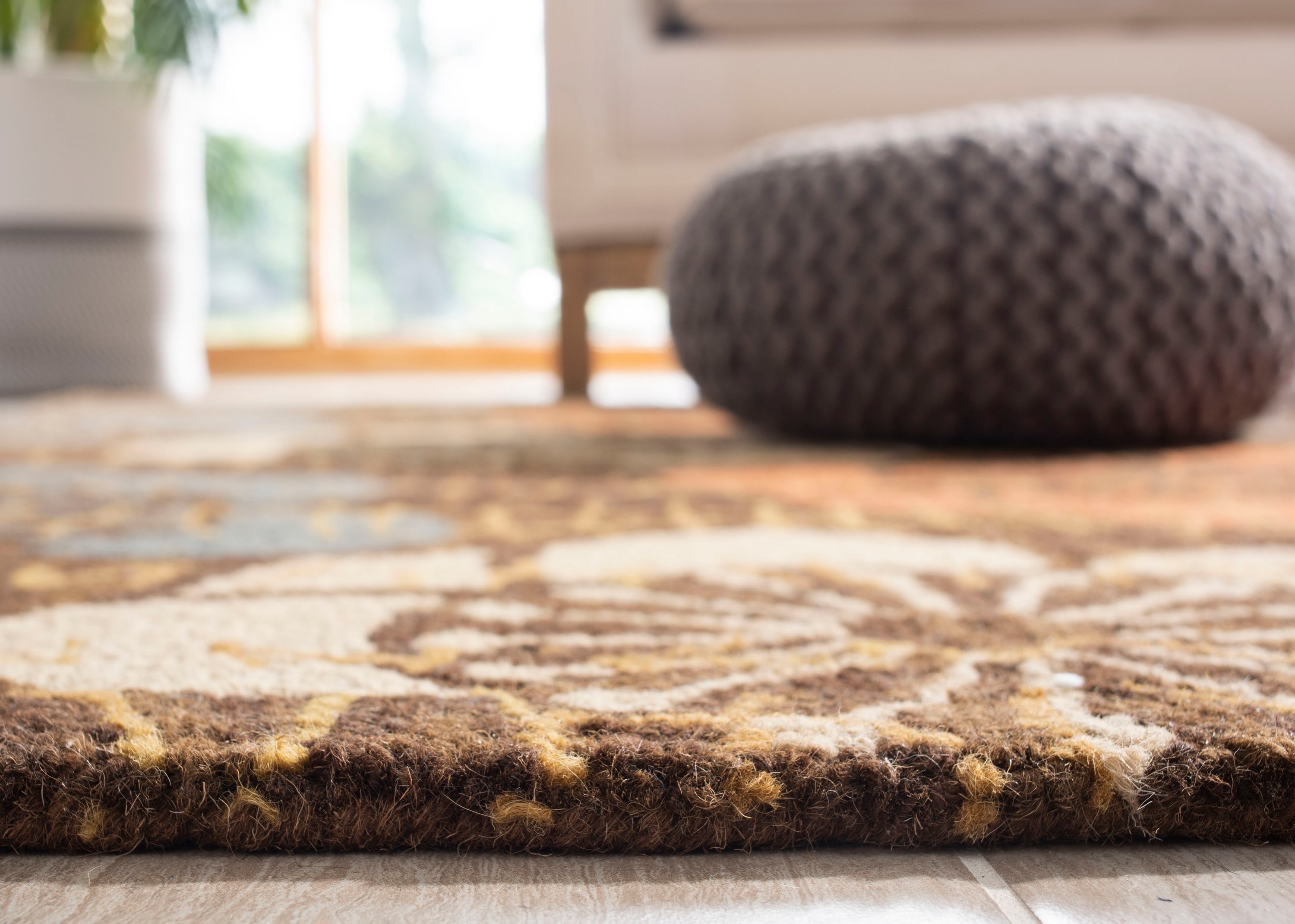 Handmade Tufted Blue and Brown Wool Floral Rug