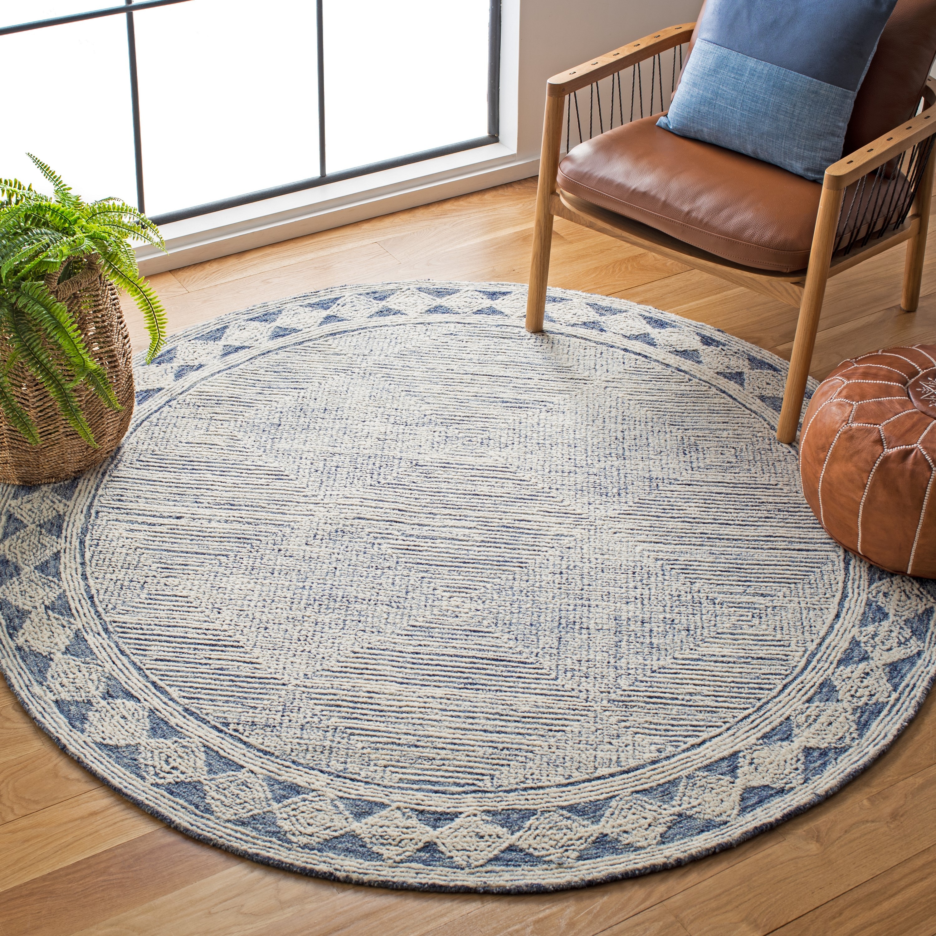 Ivory and Navy 4' Round Hand Tufted Wool Area Rug