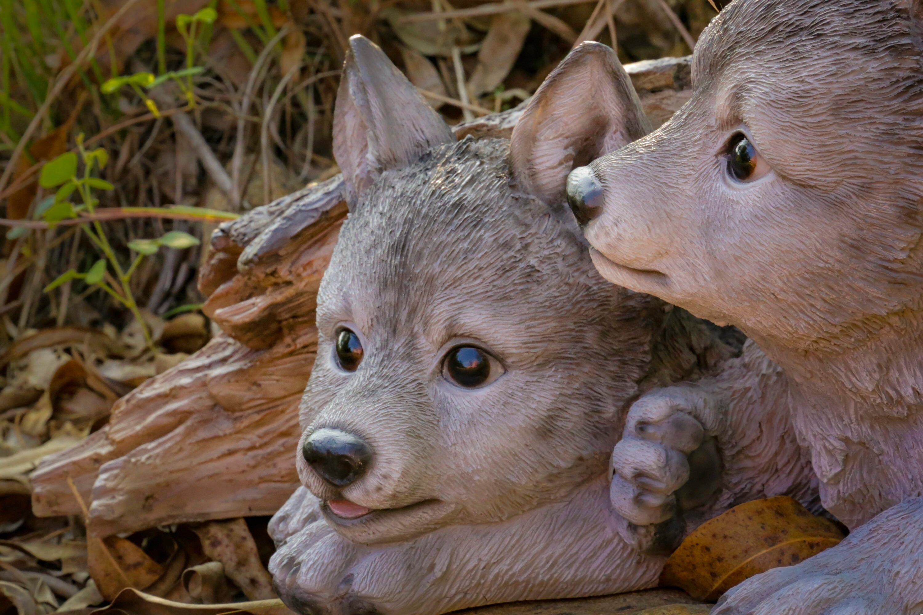 Hi-Line Gift Grey Wolf Cubs Hiding Under Log Statue