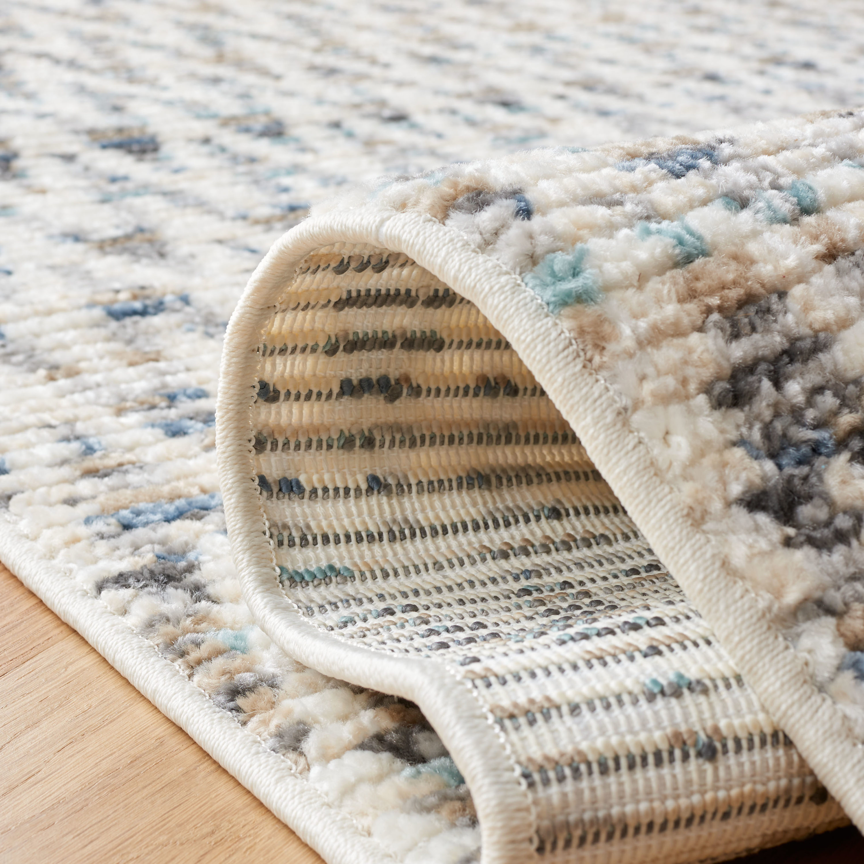 Ivory Easy-Care Synthetic Reversible Area Rug 54x16 Inches