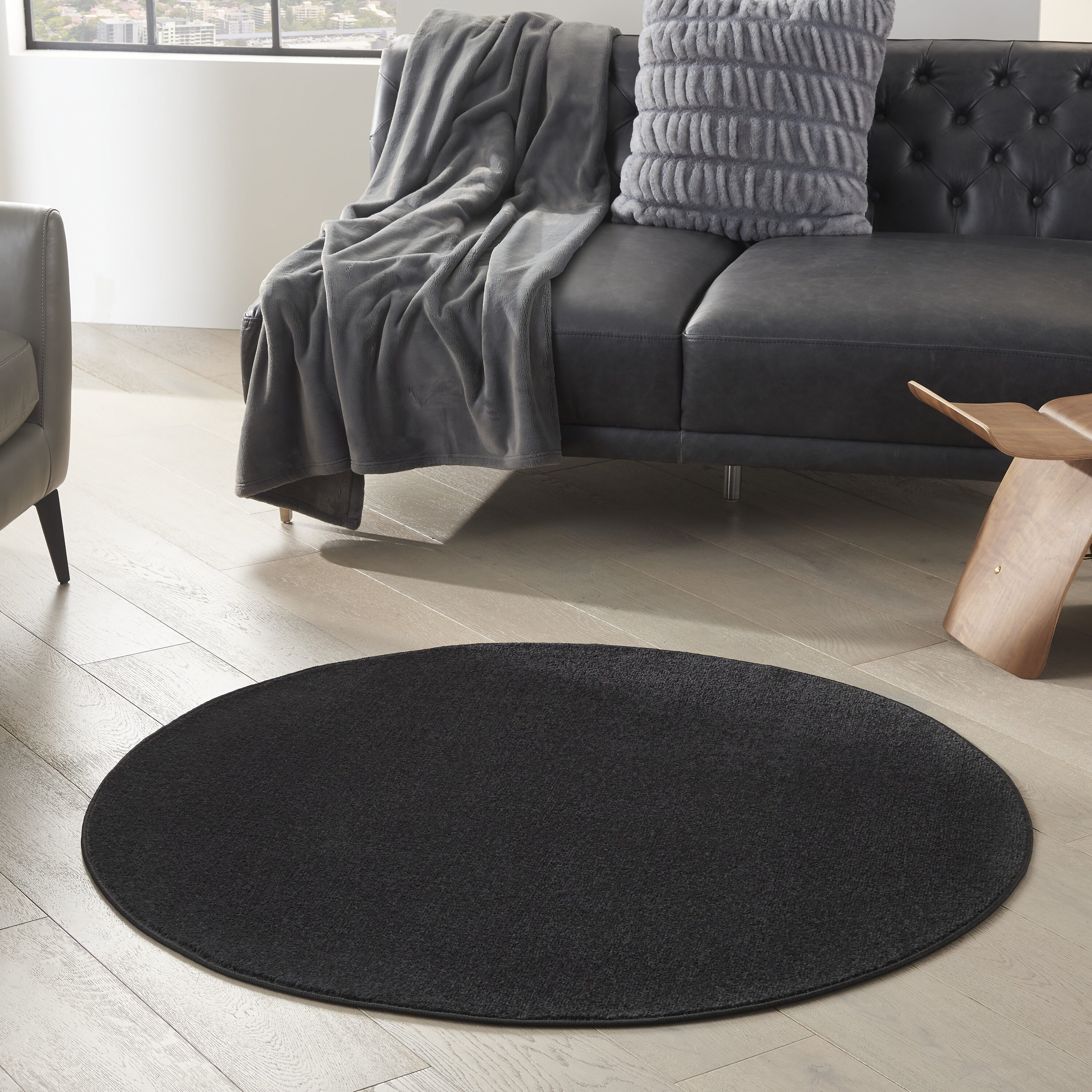 Nourison 099446821782 Essentials 4 x 4 (ft) Loomed Polypropylene Black Round Indoor/Outdoor Solid Area rug