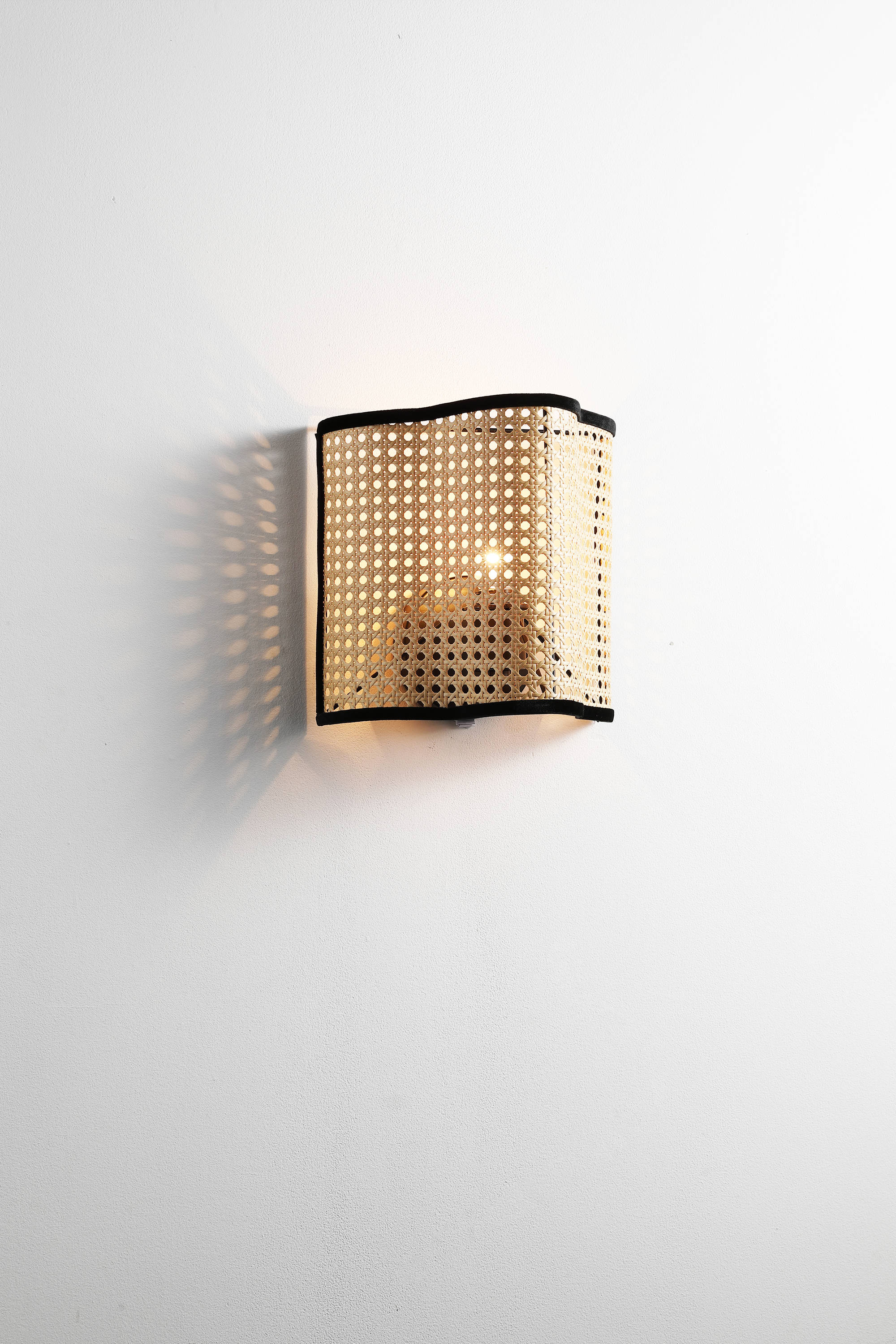 perforated wall sconce