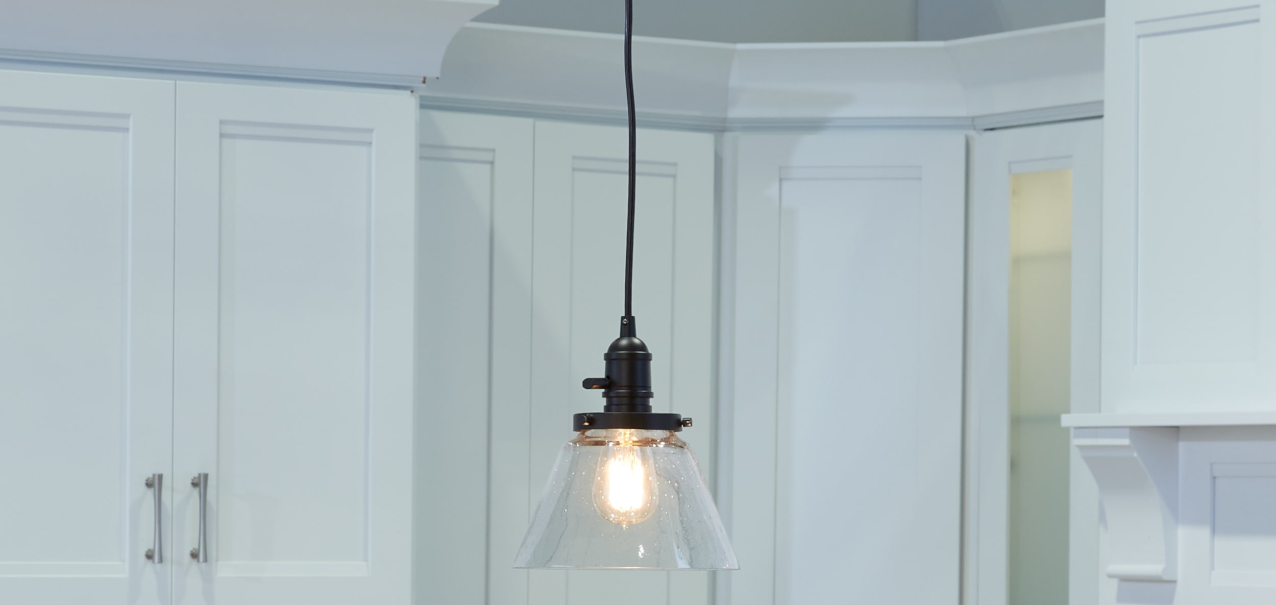 Avery Distressed Bronze 8.75" Mini Pendant with Clear Seeded Glass