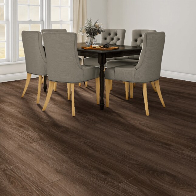 Style Selections Woodfin Oak 7-mm T x 7-in W x 50-in L Wood Plank Laminate Flooring (26.8-sq ft / Carton)